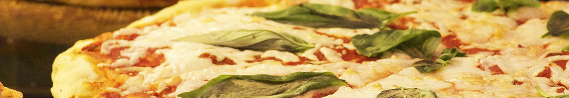 Eating Italian Pizza at Regina's Pizzeria restaurant in Queens, NY.